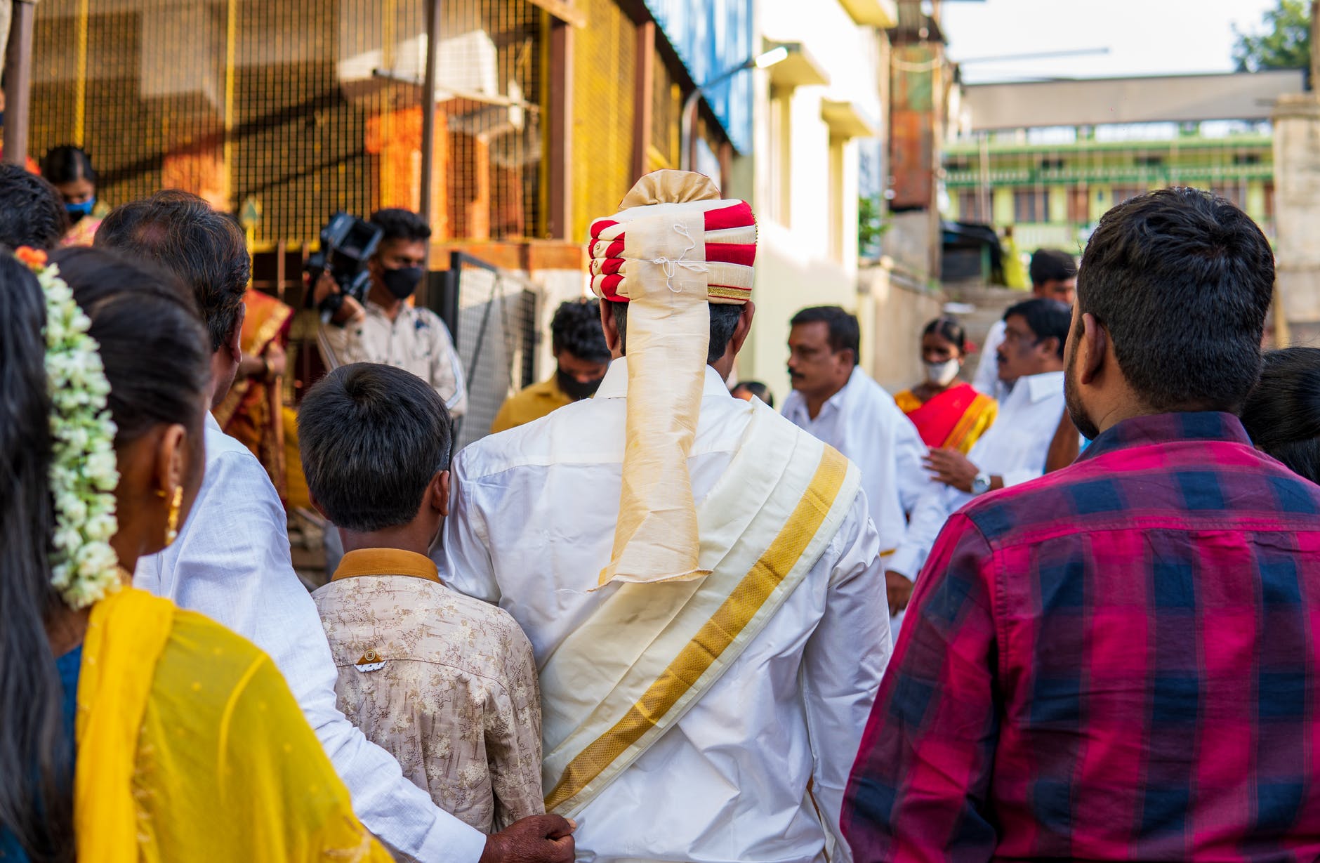 a groom with a headdress